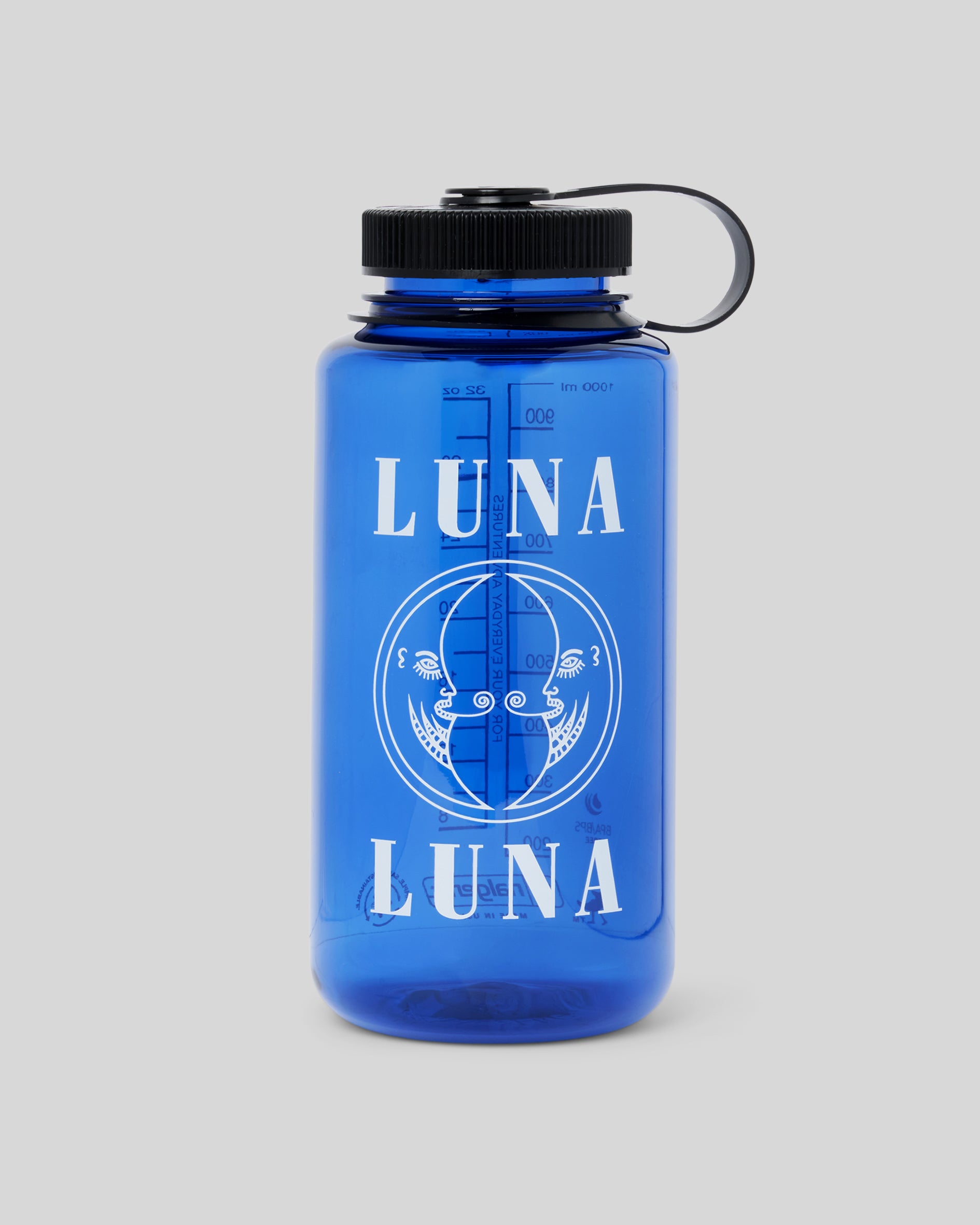 Photo of the 1987 Classic Logo Nalgene Water Bottle. Cobalt blue Nalgene water bottle with Luna Luna logo