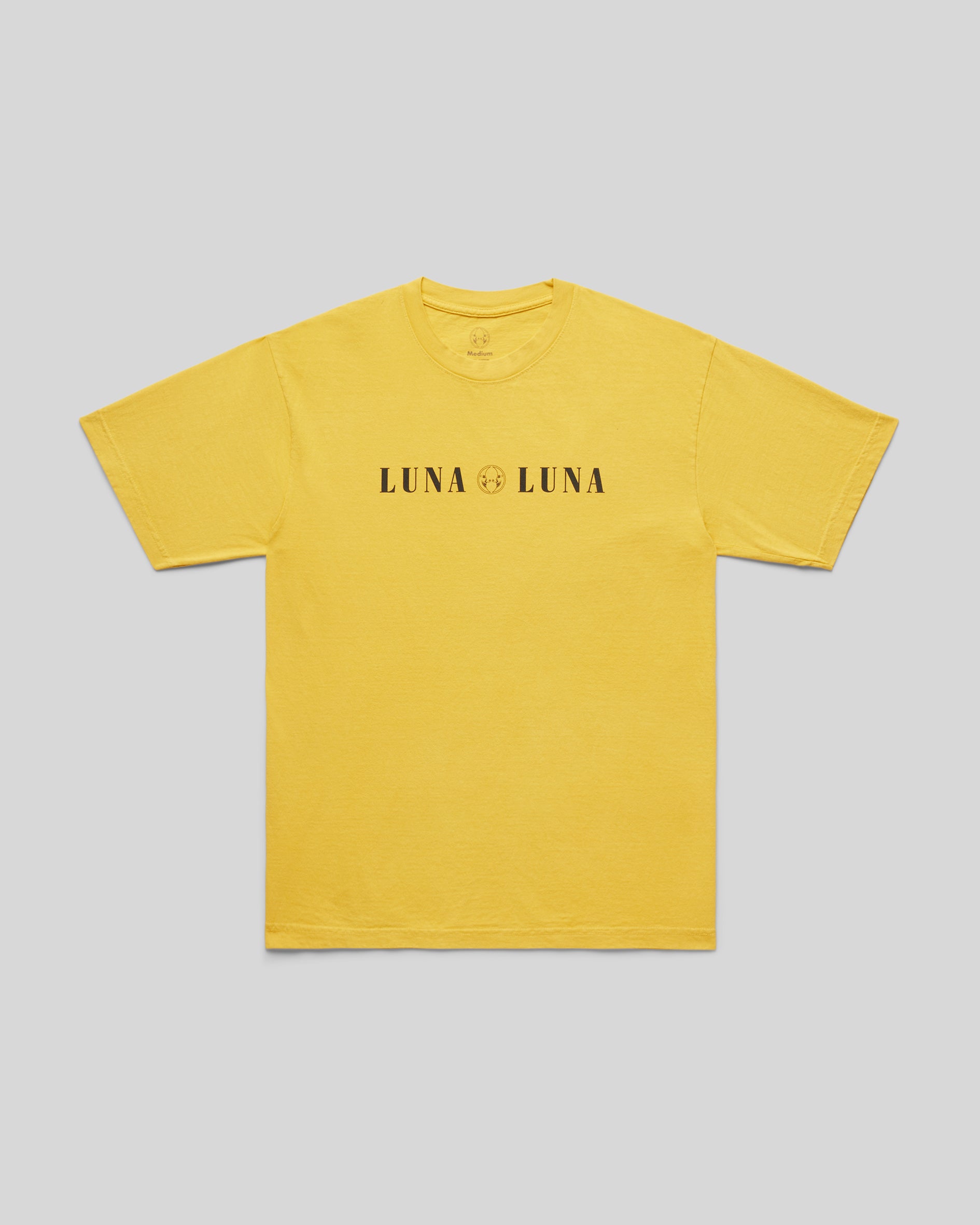 1987 Luna Luna T-Shirt in Yellow. Yellow t-shirt with black text at chest that reads "LUNA LUNA"