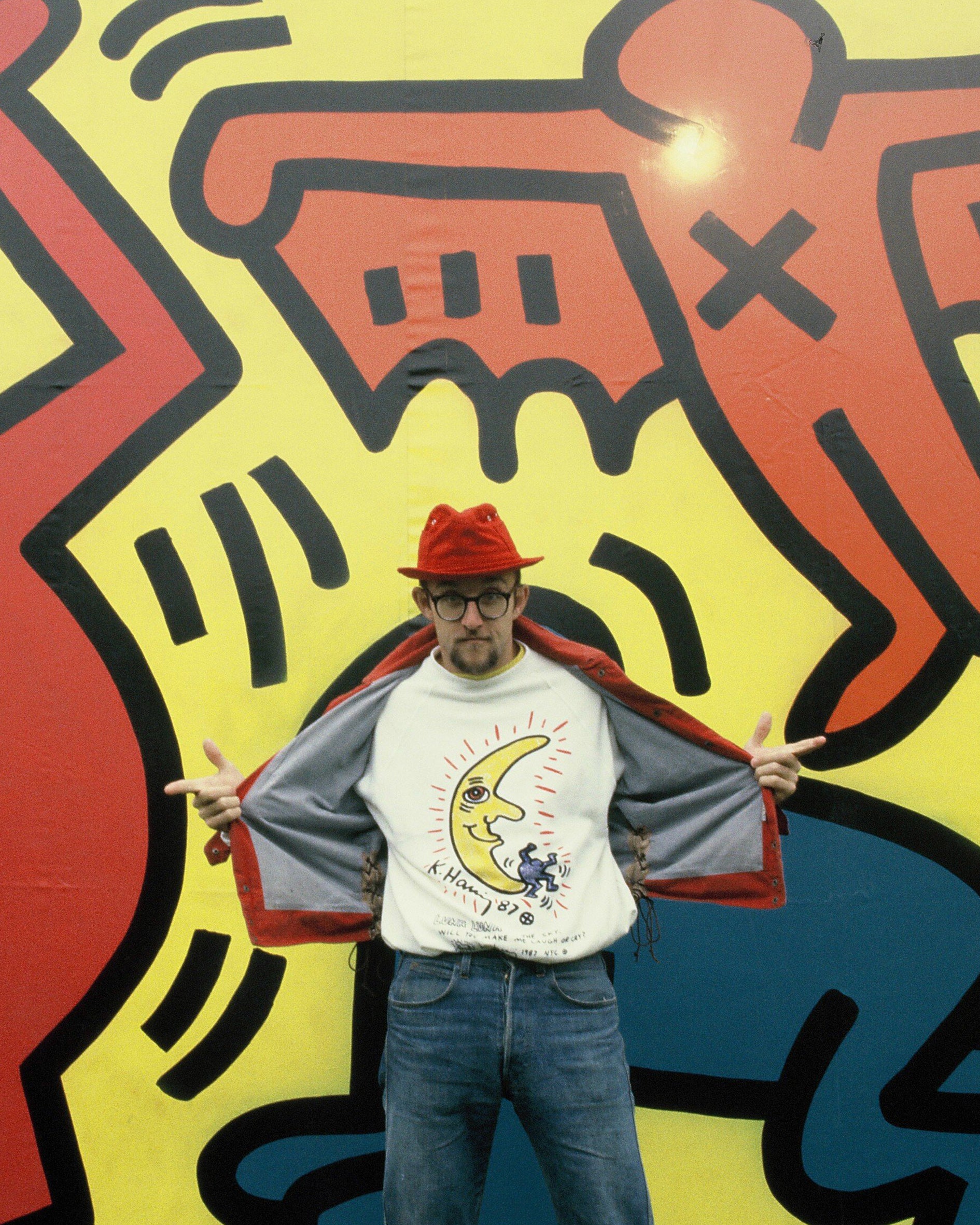 Archive photograph of Keith Haring wearing the Archival white Fitted Keith Haring sweater